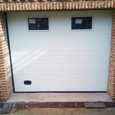 Puerta garaje seccional en panel acanalado